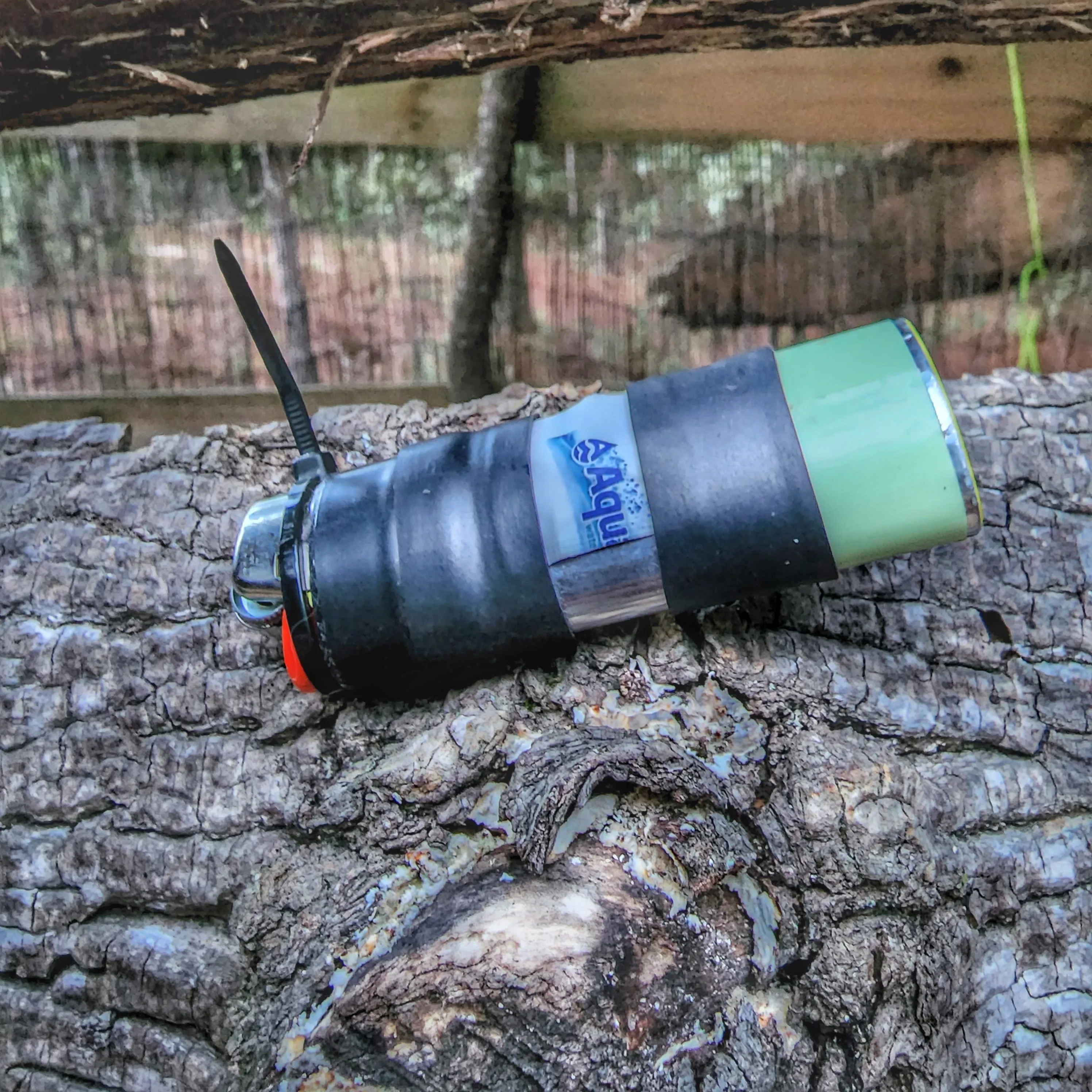 Survival Kit Lighter - Fire Starter outfitted with supplies.